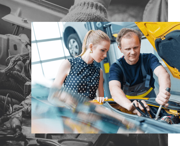 Collision repair technician preparing a vehicle surface